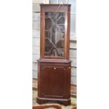 A Georgian design mahogany standing corner cabinet