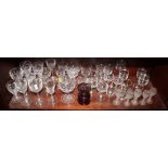 A 19th Century ruby flashed glass urn shaped vase and a collection of assorted drinking glasses