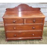 A 19th Century mahogany bowfront chest of two short and three long drawers with turned wooden knobs,