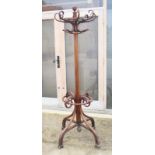 A late Victorian bentwood hat stand, on splay supports