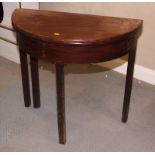 A George III mahogany half round fold-over top tea table, on square fluted supports, 32" dia (top