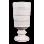 A turned ivory goblet on pedestal base, 7" high