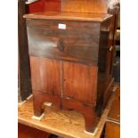 A mahogany side cabinet, fitted lift-up lid over cupboards, on bracket supports, 17" wide