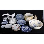 An assortment of pottery and porcelain to include a model bird, blue and white, Royal Worcester,