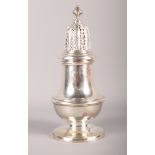 A silver sugar caster, retailed by Harrods, 6 1/4" high, 7.3oz troy approx