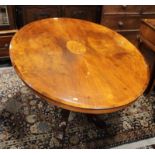 A Victorian walnut and inlaid floral marquetry oval loo table, on five turned pillars and four