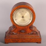 A 19th Century barometer in walnut drum head case, silvered dial with thermometer inscribed "H