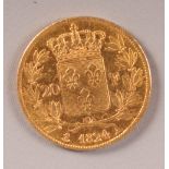 A French 20 franc gold coin dated 1824