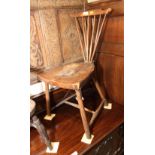 An early 20th Century side chair with shield-shaped seat, on turned and stretchered supports