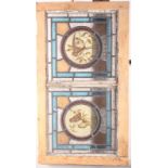 An Edwardian stained glass window decorated birds, 28 3/4" x 15 3/4"