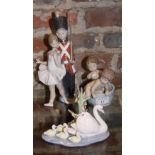 A Lladro group, swan and cygnets "Follow Me", a companion figure, "Bath Time" two children in a tub,