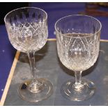 A set of six boxed Webb crystal diamond and prism cut wine glasses and a matching set of hock