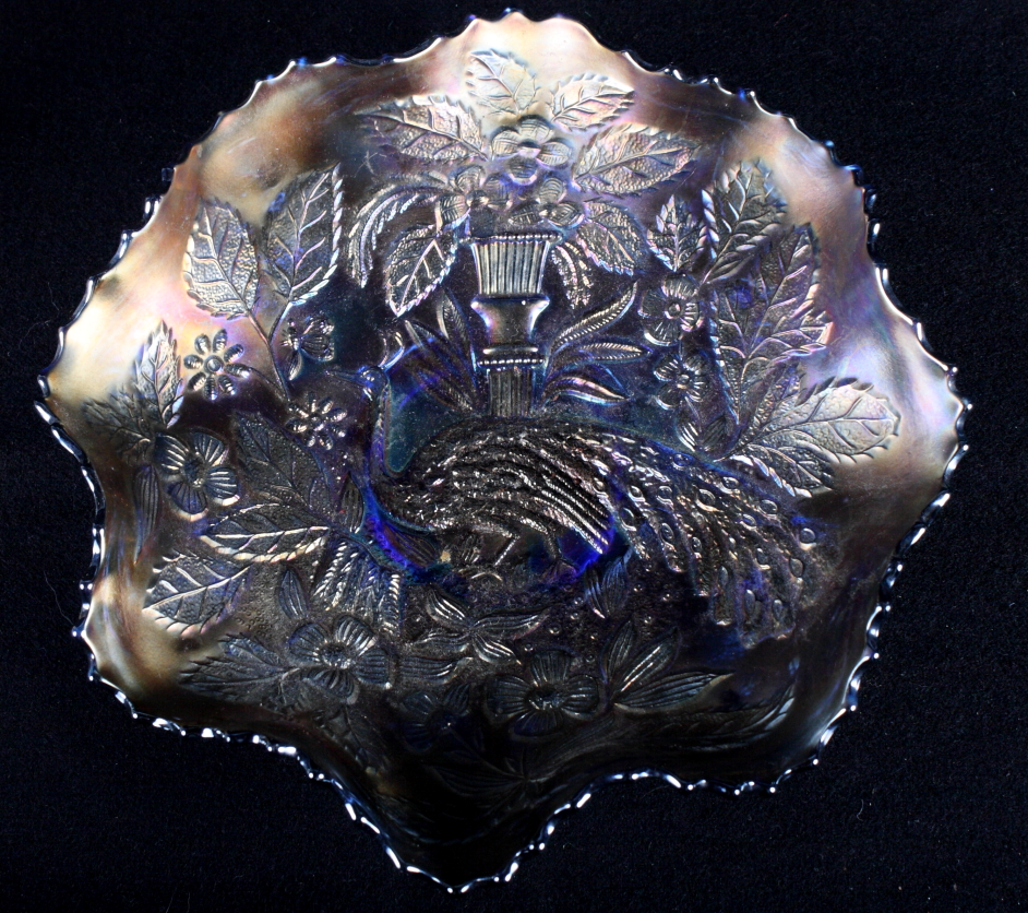 A blue Carnival glass shaped dish with peacock decoration, 8 1/2" dia