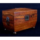A rosewood and line inlaid two-compartment sarcophagus tea caddy with lion mask brass ring