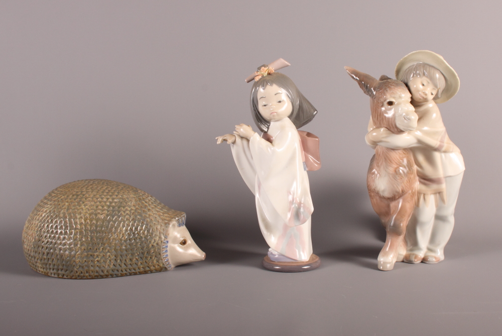 A Lladro figure of a child with donkey, a Lladro figure of Japanese girl and a Lladro model of a - Bild 2 aus 3