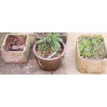 Two terracotta planters and one other planter