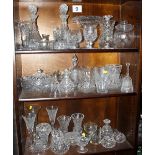 A large collection of cut glass, including decanters, bowls, tazza, vases, glasses, etc, and a Poole