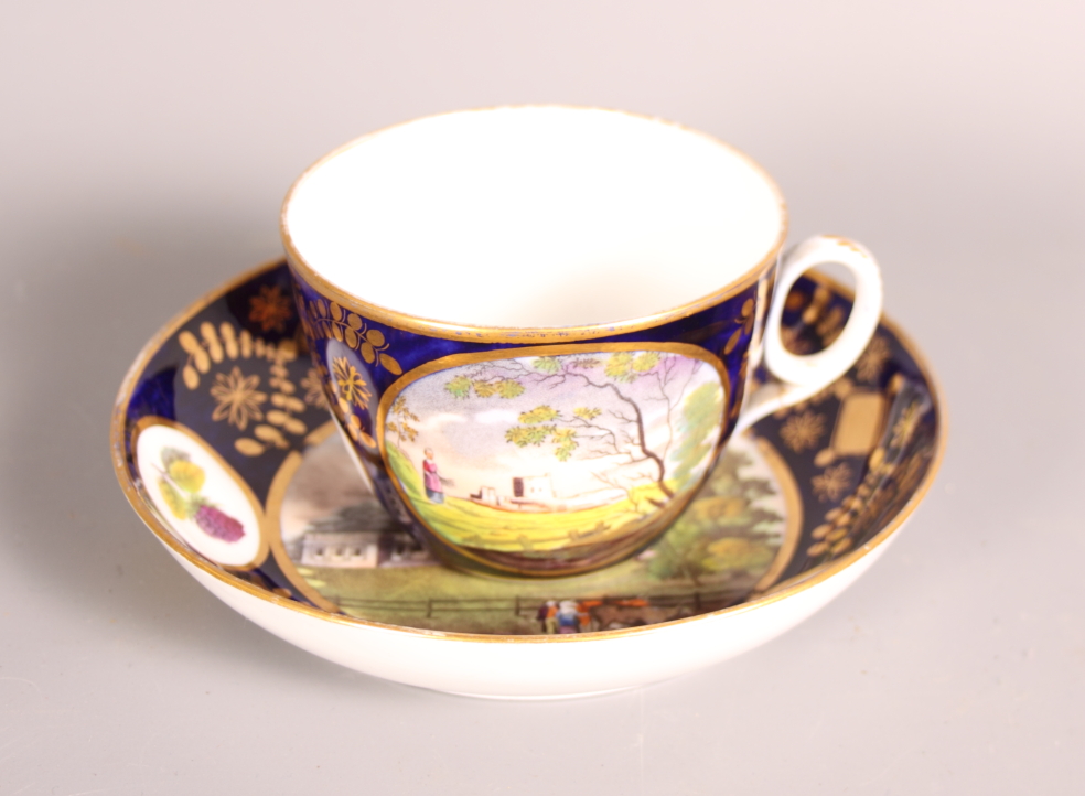 An early 19th Century Bute New Hall cup and saucer with landscape decoration