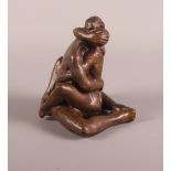 T Merrifield: a bronze sculpture of a couple embracing, limited edition 9/95, 3 1/2" high, and a