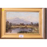 A 19th Century oil on card, landscape with lake and distant mountains, 8" x 12", in gilt frame,