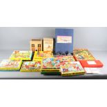 A collection of mid 20th Century mostly wood jigsaw puzzles and a number of games, etc, a set of