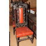 A pair of 19th Century Carolean design dark oak side chairs with pierced backs having crown