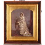 A 19th Century hand-tinted photograph of a bride by a jardiniere, in gilt and rosewood frame, 22"