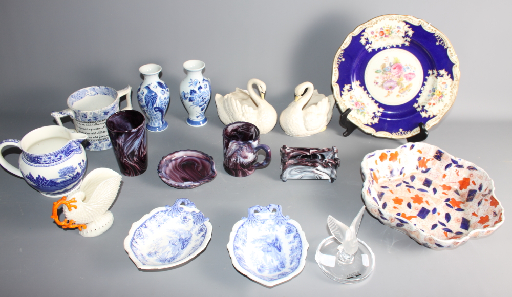A large collection of glass and pottery to include a Wedgwood jug, a Lalique glass bird, a Belleek
