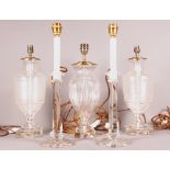 A pair of cut glass vase style table lamps on square bases, 17" high, a single cut glass table