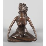 T Merrifield: a bronze sculpture of a semi-clad ballerina sitting cross legged, limited edition 3/