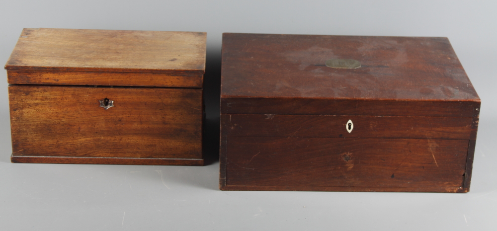 A 19th Century rectangular mahogany two-division tea caddy, 10 1/2" wide, and a larger mahogany box,