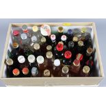A collection of miniature bottles of whisky, brandy, etc, 38 approx