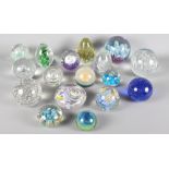 A collection of glass paperweights, assorted designs, 16 approx