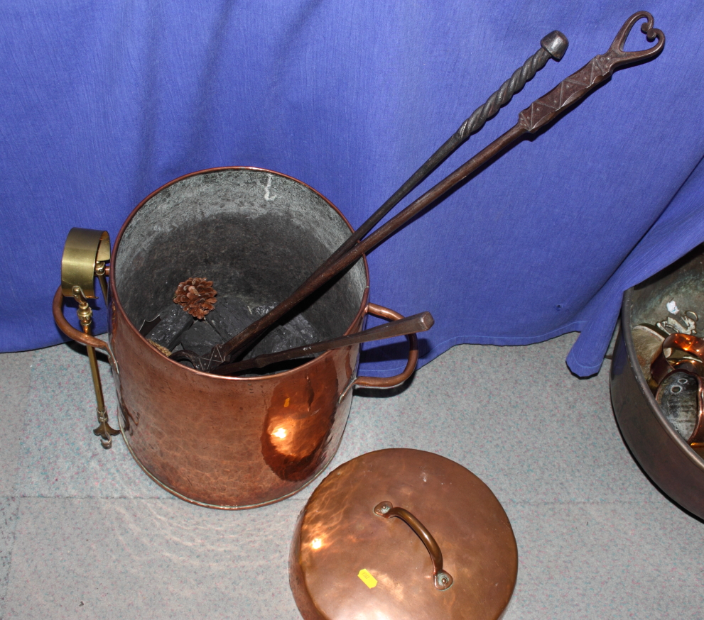 A 19th Century cylindrical copper pan and assorted metal fire implements