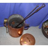 A 19th Century cylindrical copper pan and assorted metal fire implements