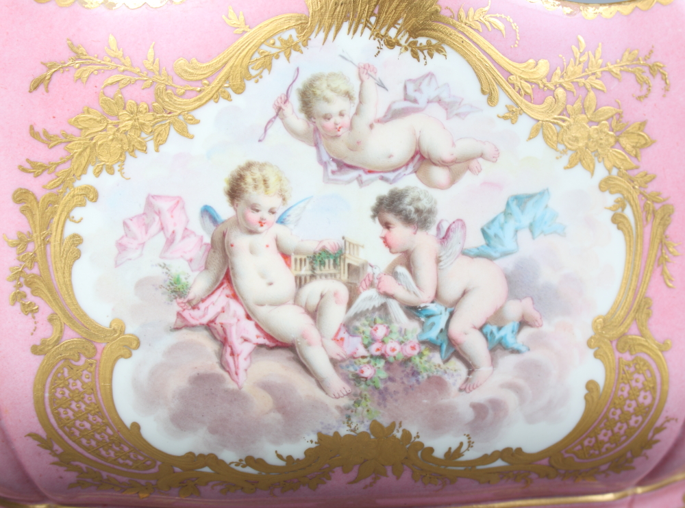 A Sevres porcelain jardiniere decorated reserves of flowers, putti and musical instruments on a pink - Image 2 of 8