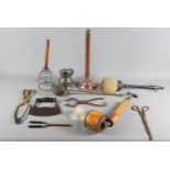 A kitchen whisk, a herb chopper and other kitchenalia, etc