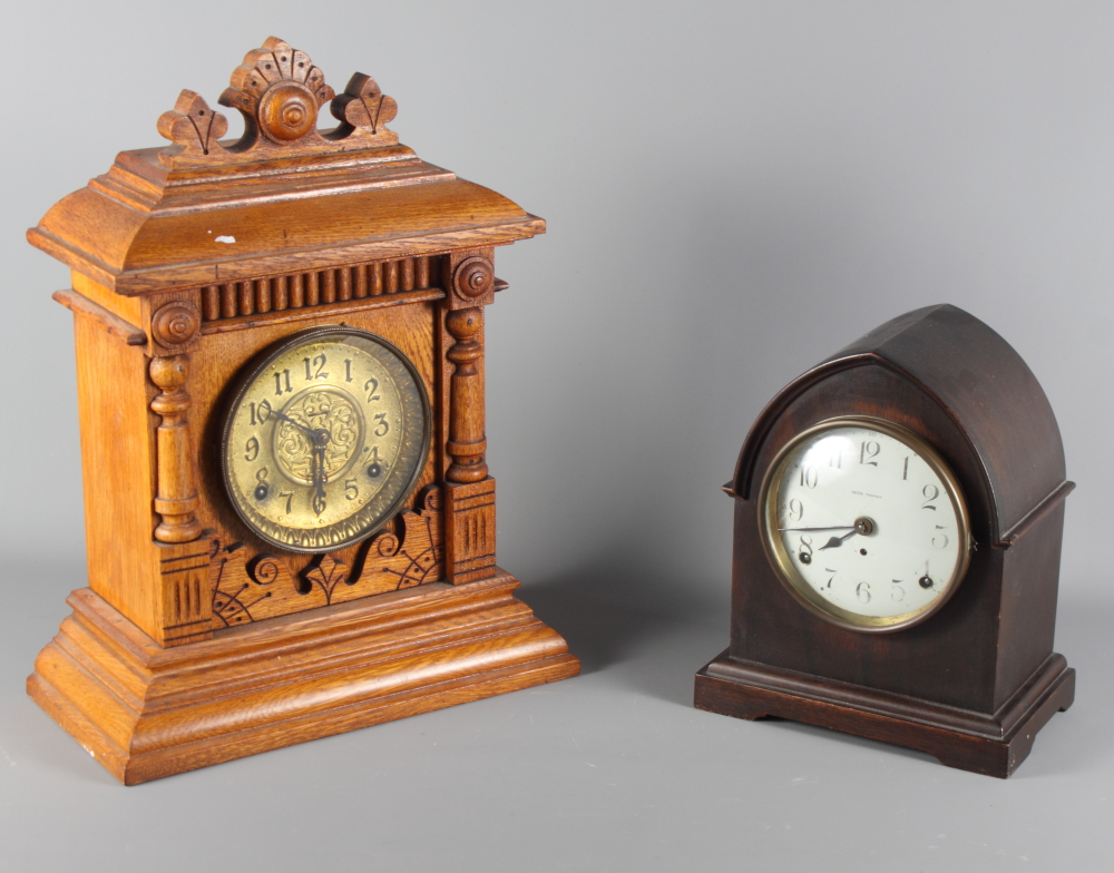 A late 19th Century oak cased mantel clock with eight-day striking movement, 17" high, and a Seth
