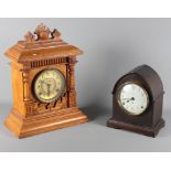 A late 19th Century oak cased mantel clock with eight-day striking movement, 17" high, and a Seth