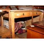 A 19th Century stripped pine side table, fitted two frieze drawers, 37" wide