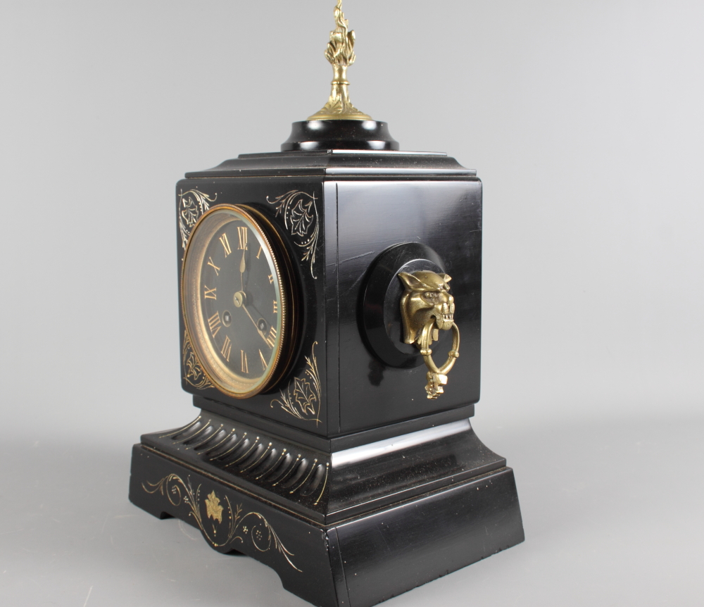 A 19th Century mantel clock in black slate case with gilt decoration, gilt metal finial and lion - Image 2 of 3