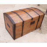 A metal bound pine dome top trunk, 43" wide