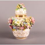 A 19th Century porcelain Stevenson Sharp (Derby) flower encrusted lidded jar with gilt decoration,