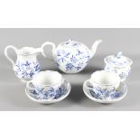 A 20th Century Meissen blue and white morning teaset decorated foliage