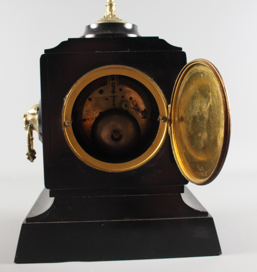 A 19th Century mantel clock in black slate case with gilt decoration, gilt metal finial and lion - Image 3 of 3