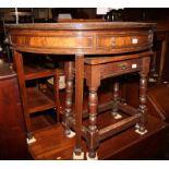 A Georgian design mahogany half round side table with panelled frieze, fitted one drawer, on