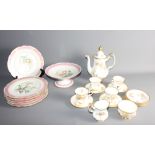 A continental porcelain dessert service with floral decoration and pink banded borders and a Royal