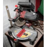 A Rexon radial arm saw, two pairs of shears, a muck fork and a De Walt corded drill