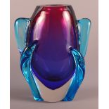 A Venetian amethyst and blue glass oviform vase (small chip to base)