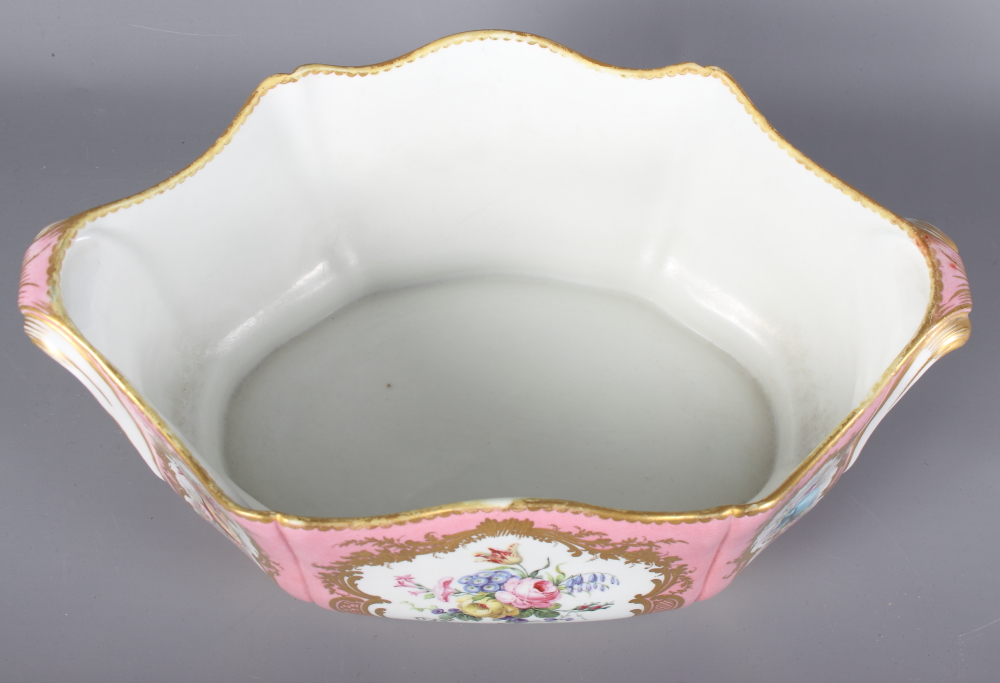 A Sevres porcelain jardiniere decorated reserves of flowers, putti and musical instruments on a pink - Image 6 of 8